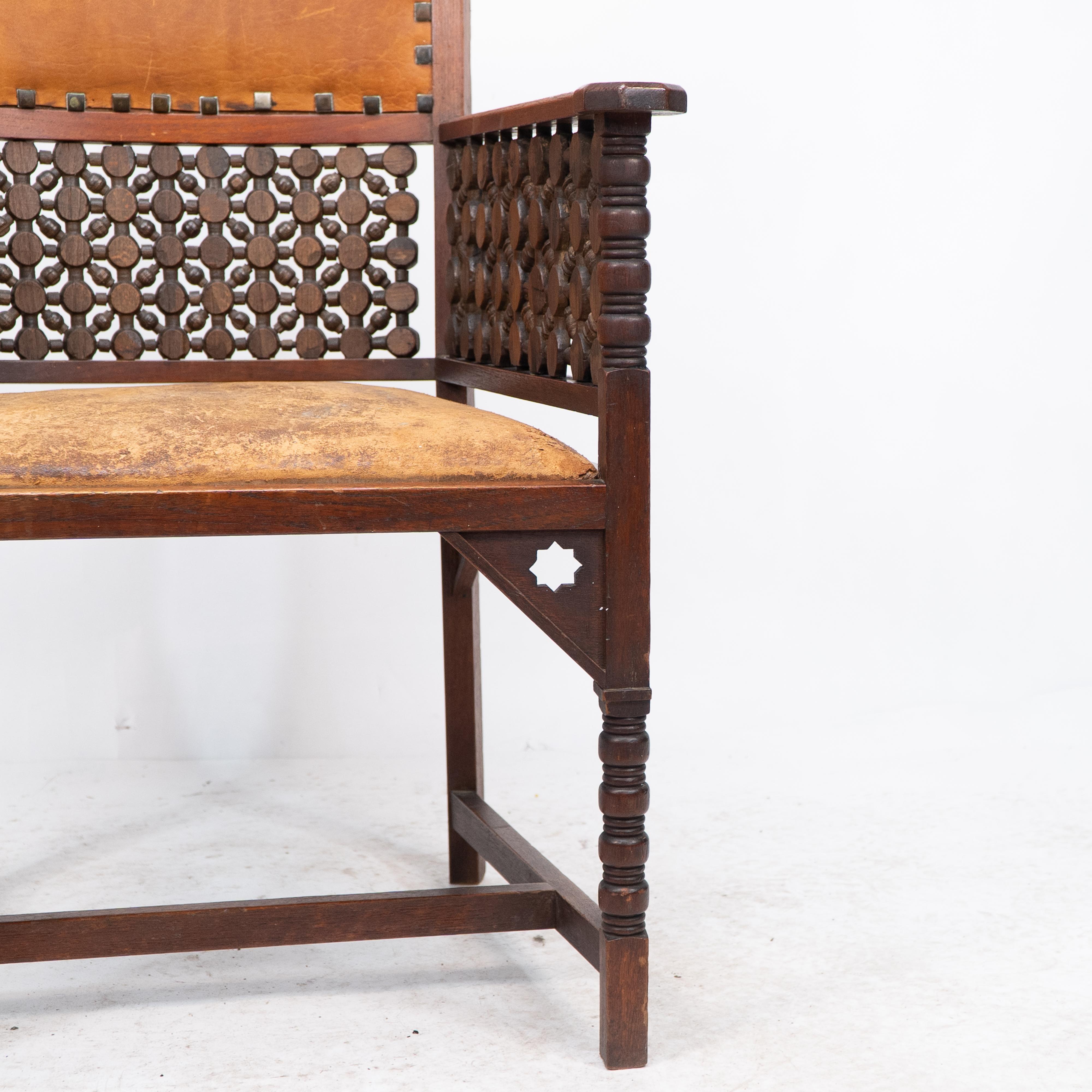 Liberty & Co. A Moorish Arts & Crafts walnut armchair with original leather seat For Sale 6