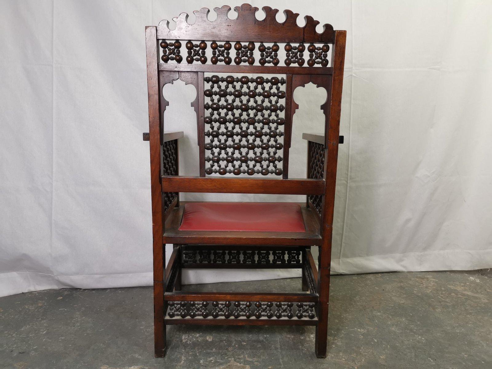 Liberty & Co a Moorish Walnut Armchair with Mashrabiya Turned Details Throughout For Sale 3