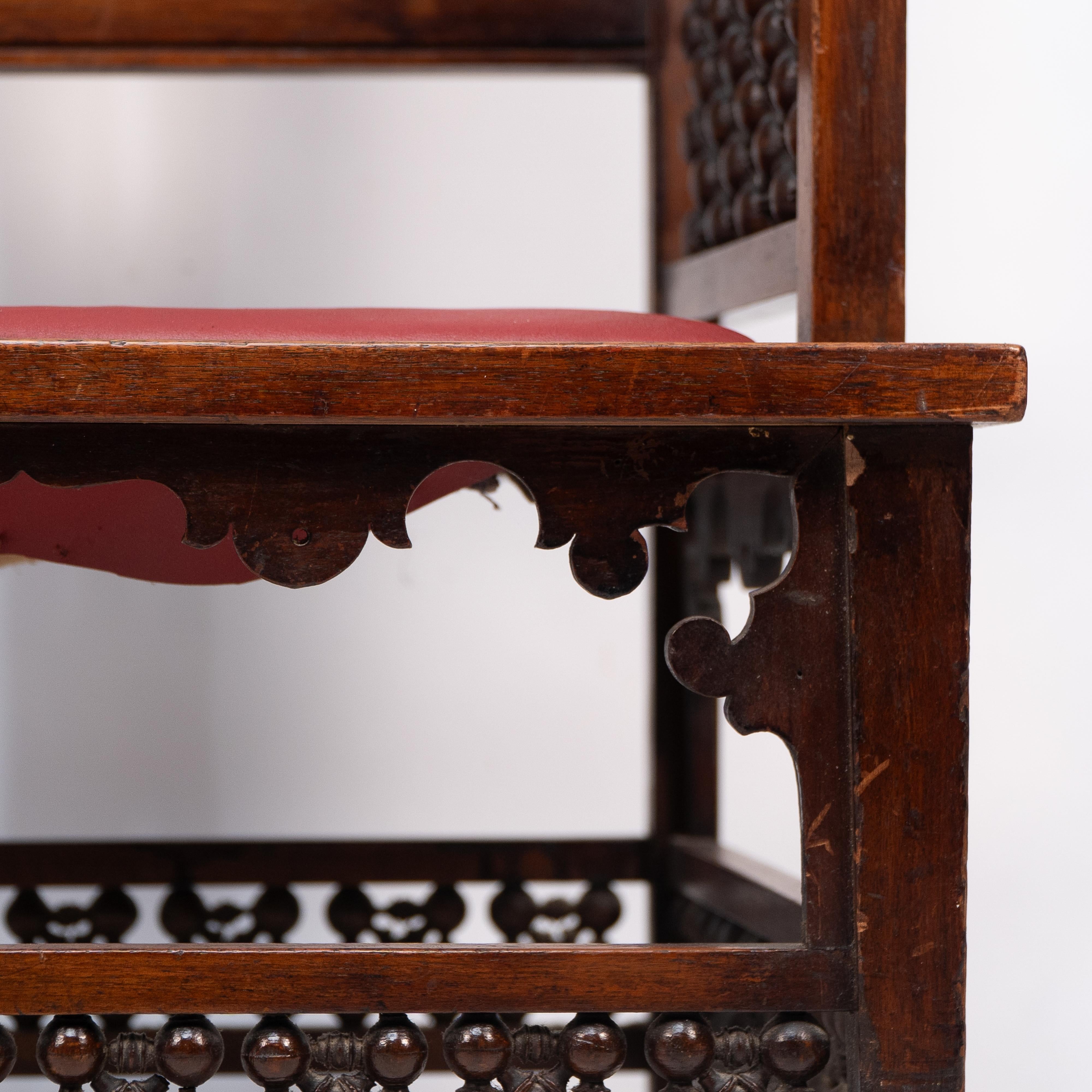 Liberty & Co A Moorish walnut armchair with Mashrabiya turned details throughout For Sale 7