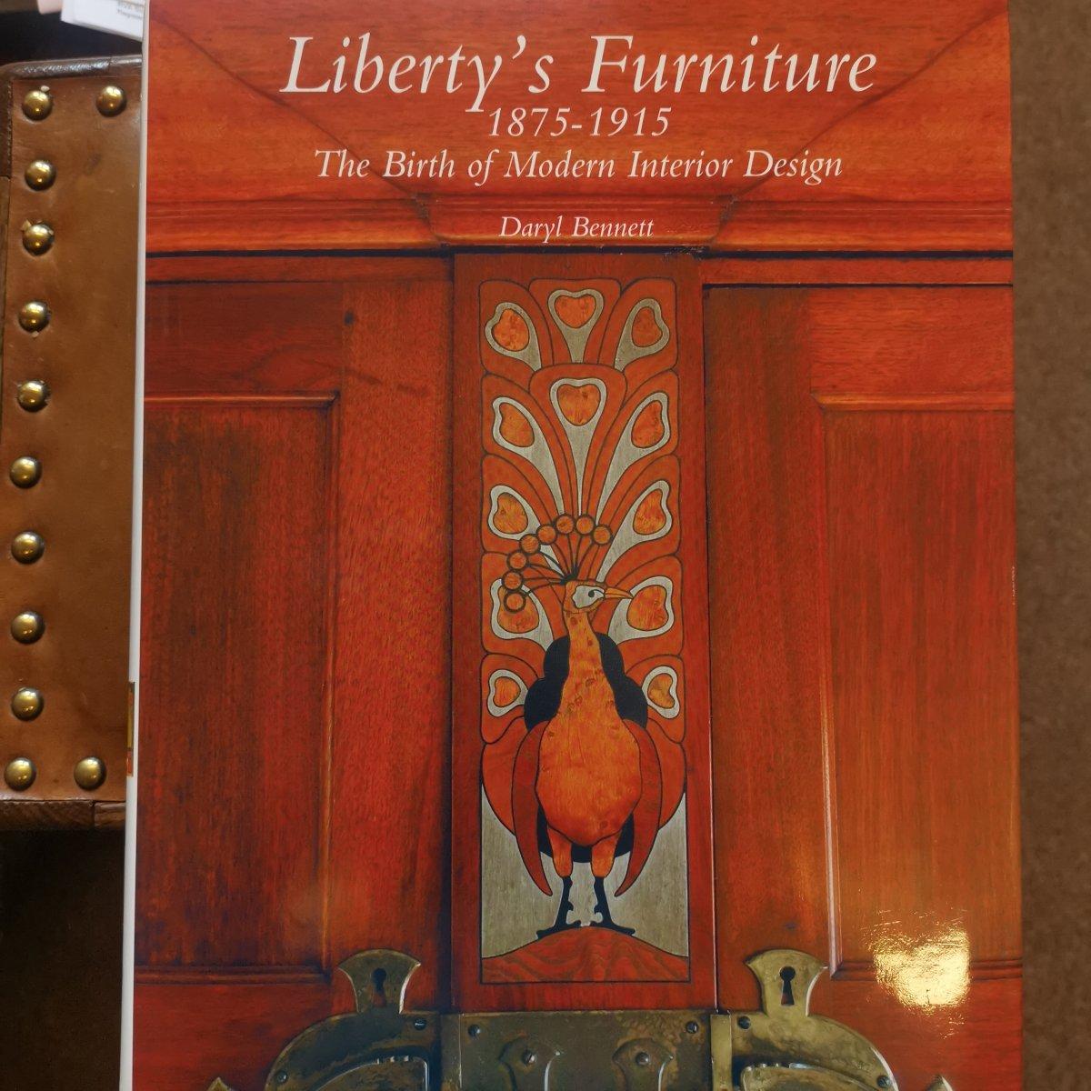 Liberty & Co A Moorish walnut armchair with Mashrabiya turned details throughout For Sale 11