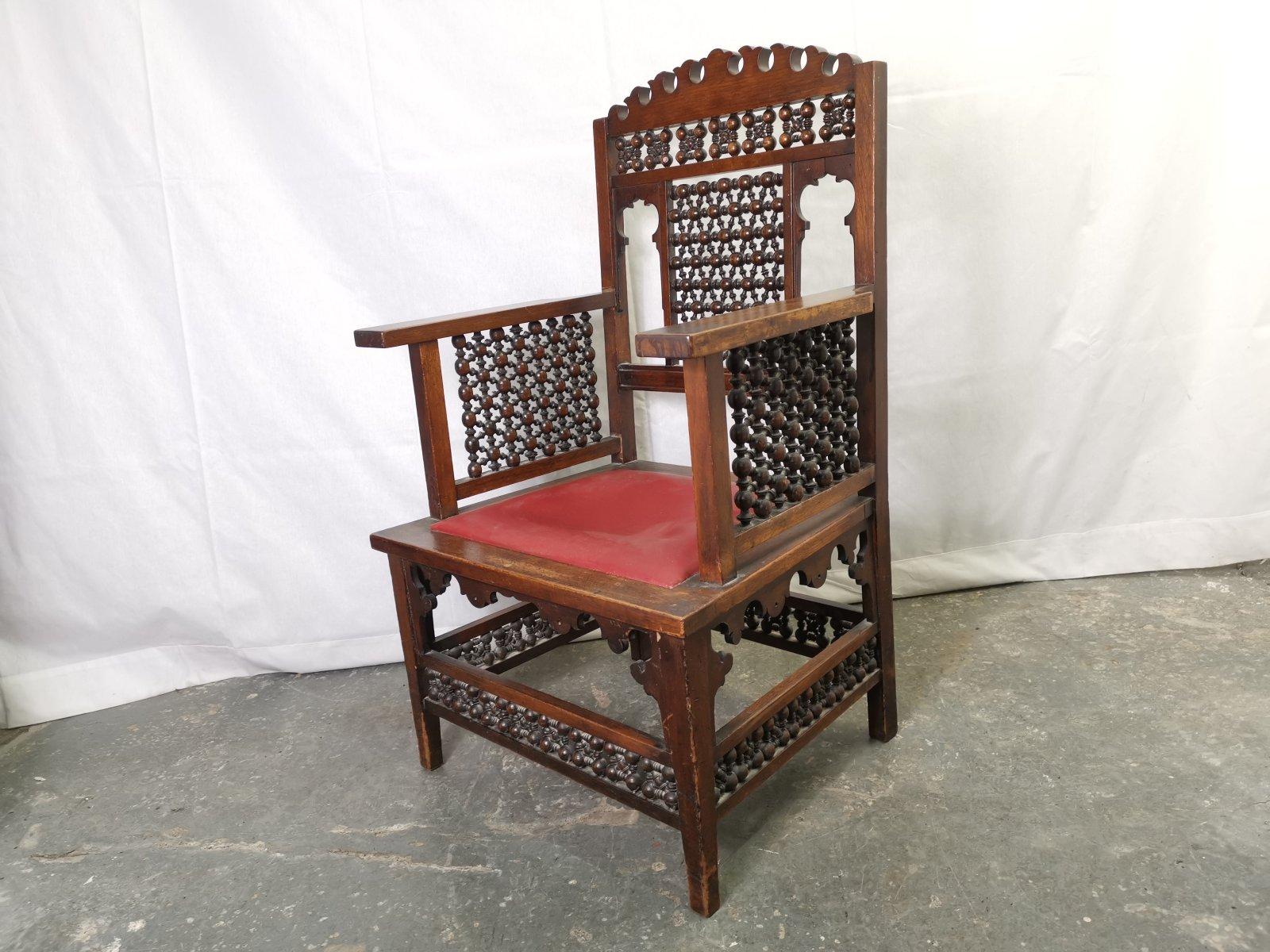 Hand-Crafted Liberty & Co a Moorish Walnut Armchair with Mashrabiya Turned Details Throughout For Sale