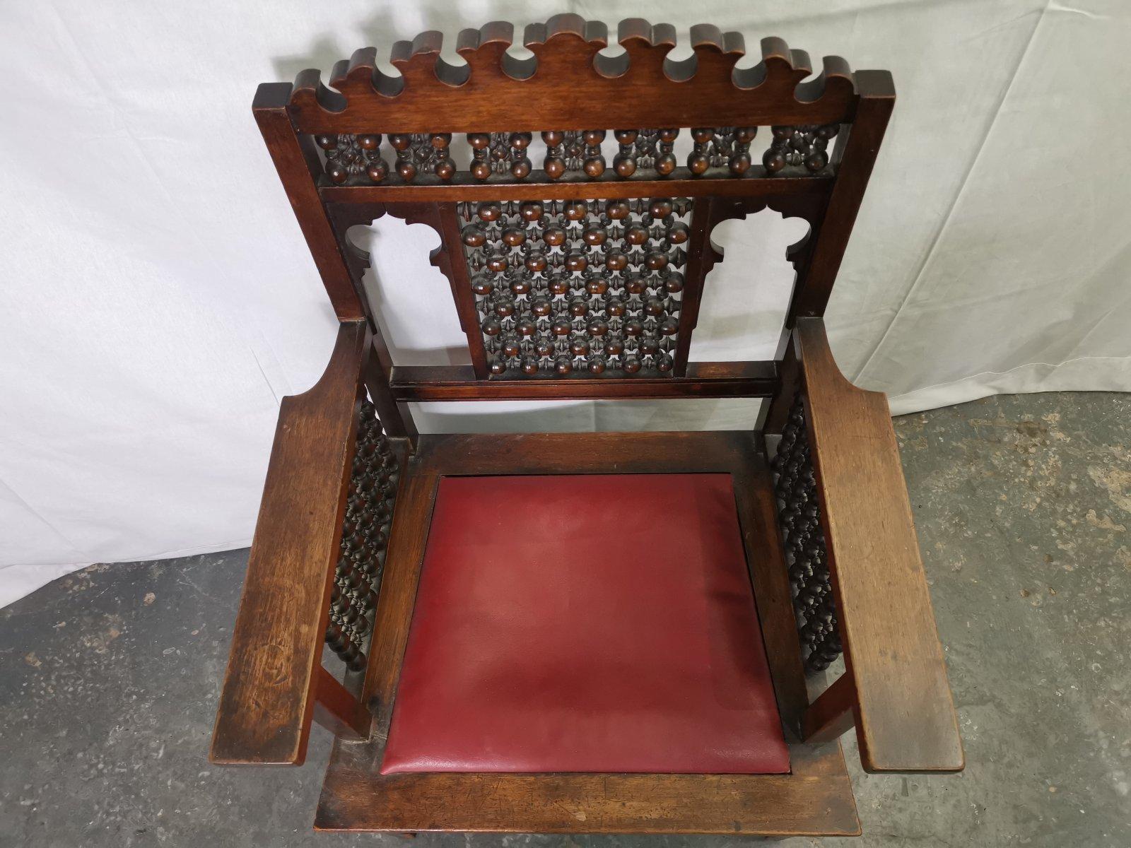 Late 19th Century Liberty & Co a Moorish Walnut Armchair with Mashrabiya Turned Details Throughout For Sale