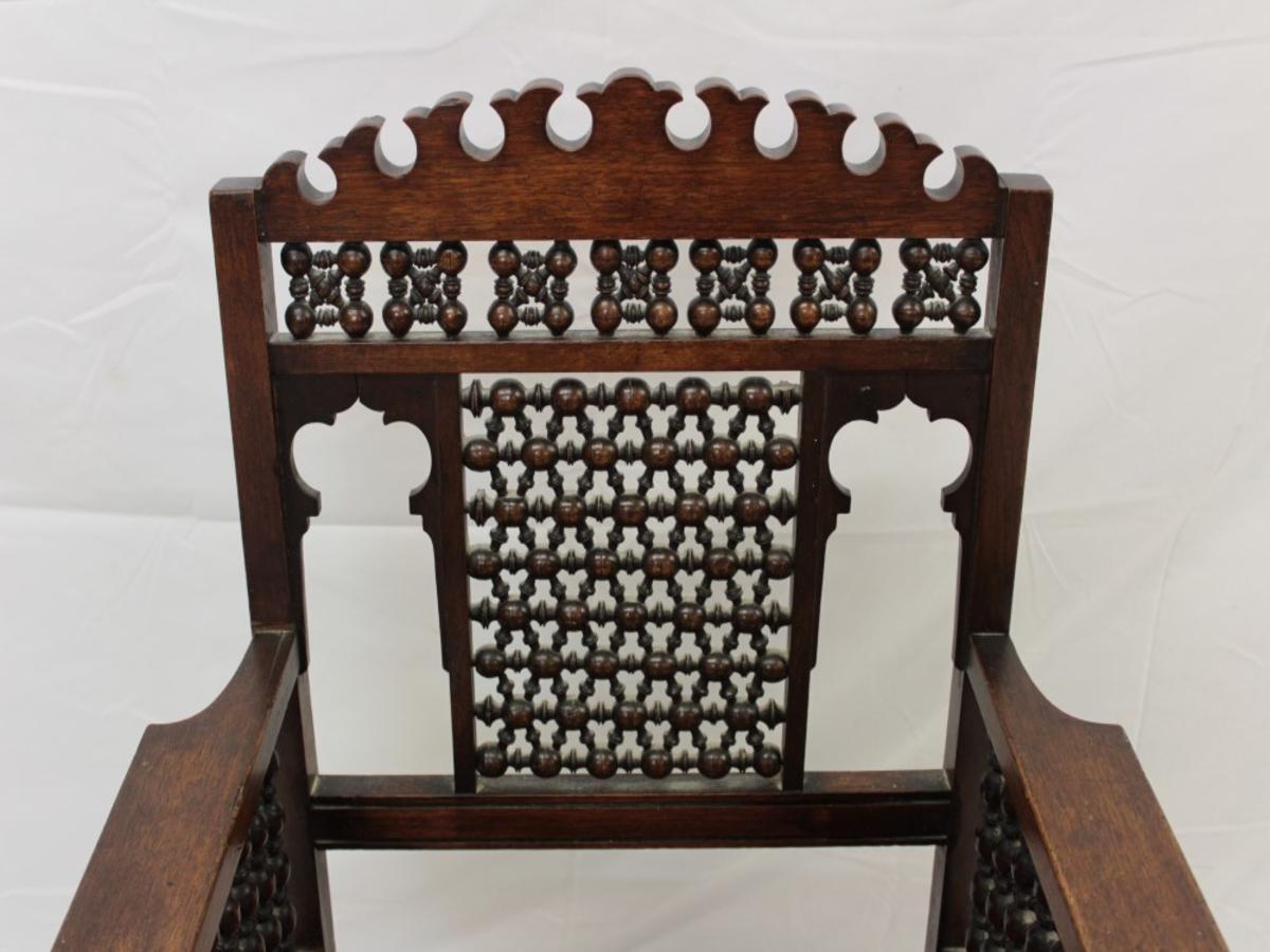 Liberty & Co a Moorish Walnut Armchair with Mashrabiya Turned Details Throughout For Sale 2