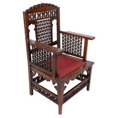 Liberty & Co Ein maurischer Sessel aus Nussbaumholz mit gedrechselten Mashrabiya-Details throughout