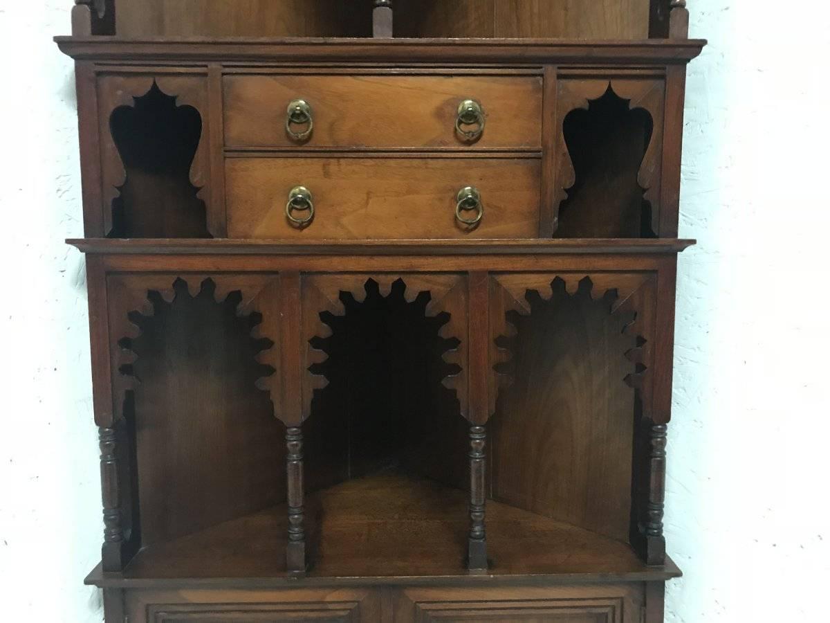 Late 19th Century Liberty & Co. a Moorish Walnut Corner Cupboard with Musharabieh Turned Details