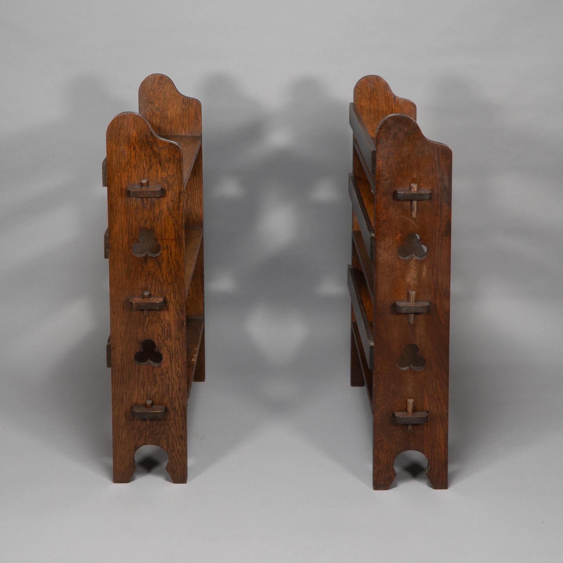 Liberty and Co. A pair of 'The Radley portable bookcase' solid oak with trefoil details on the sides and pegged joints.
Illustrated in Liberty's Furniture 1875 - 1915 'The Birth of Modern Interior Design' - Daryl Bennett
Page 73 Illustration 6.20