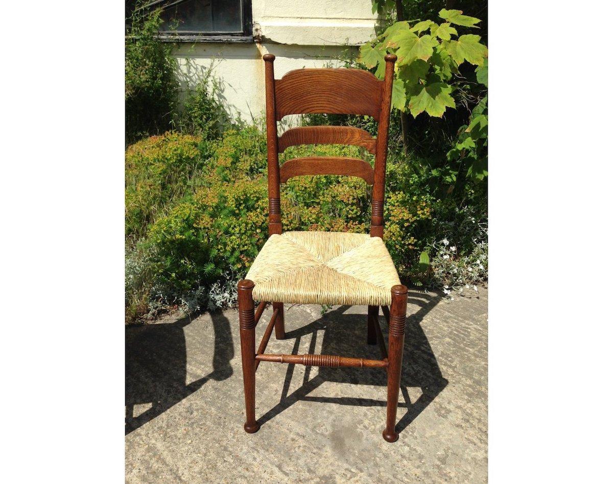 Liberty & Co. a Pair of William Birch Arts & Crafts Oak Rush Seat Dining Chairs For Sale 3