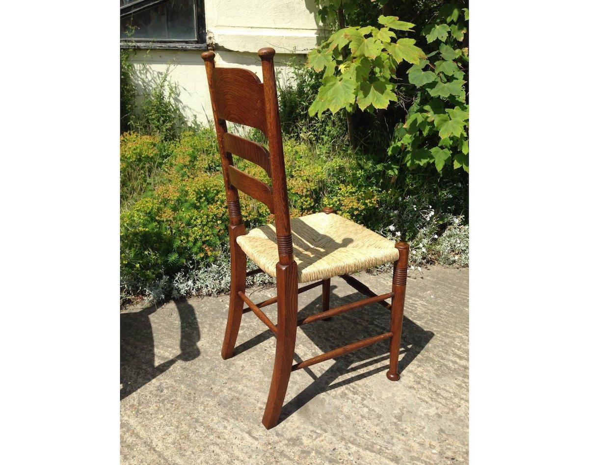 Liberty & Co. a Pair of William Birch Arts & Crafts Oak Rush Seat Dining Chairs For Sale 4