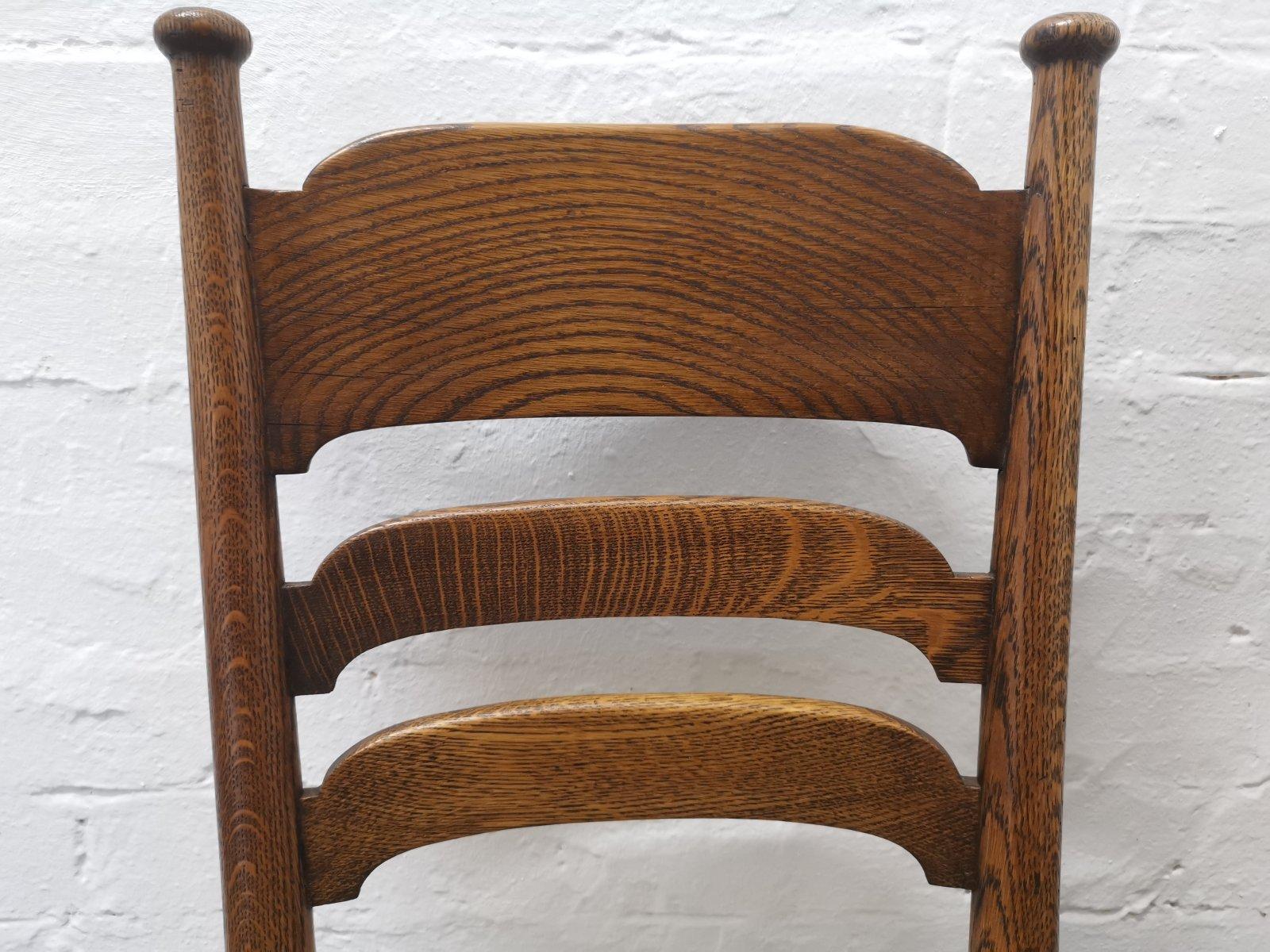 Liberty & Co. a Pair of William Birch Arts & Crafts Oak Rush Seat Dining Chairs In Good Condition For Sale In London, GB