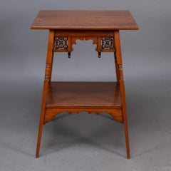 Liberty & Co. A rare Moorish Anglo-Japanese walnut sidetable