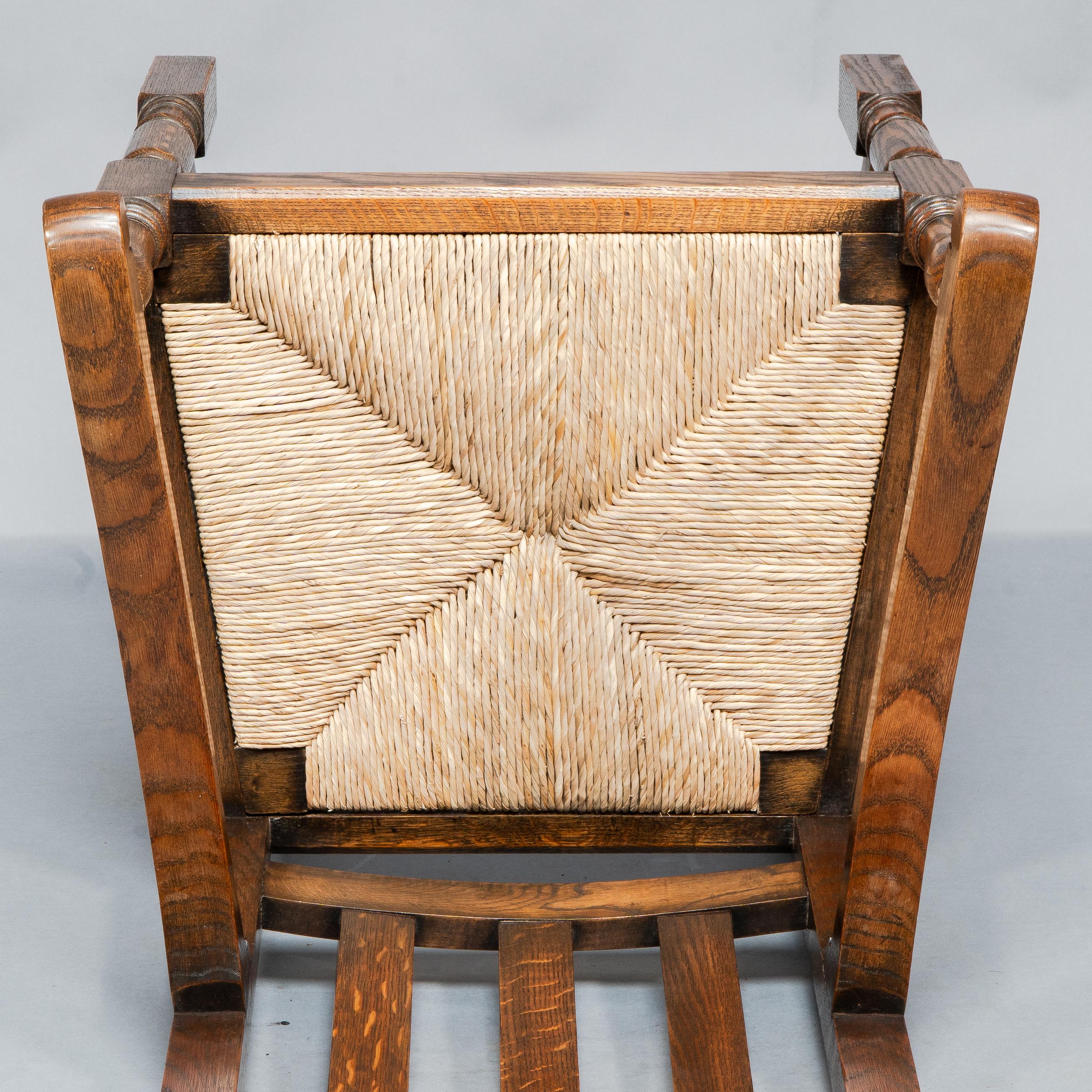 Liberty & Co. A Set of Six Arts & Crafts Oak Arrowhead Rush Seat Dining Chairs. For Sale 13