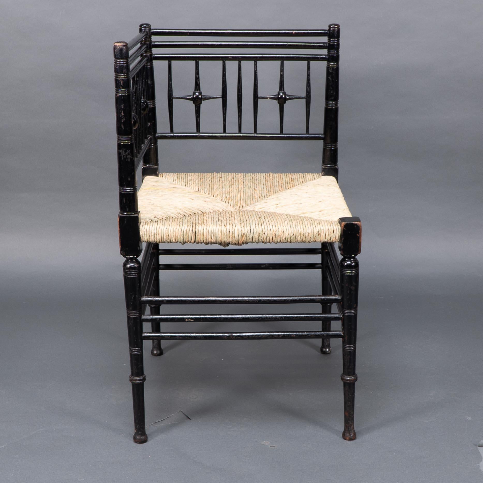 Late 19th Century Liberty & Co. Aesthetic Movement ebonized corner armchair from the Argyll suite For Sale