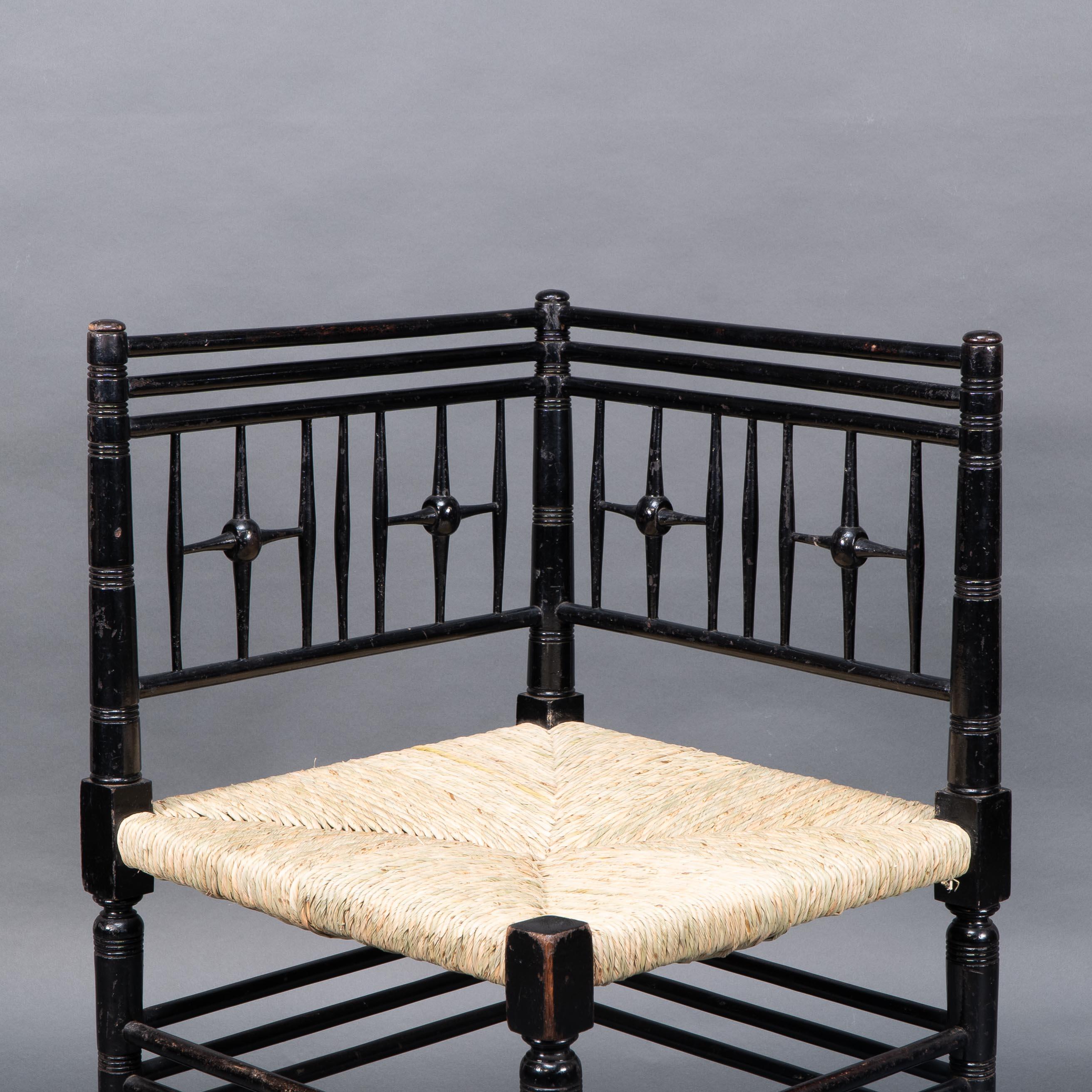 Beech Liberty & Co. Aesthetic Movement ebonized corner armchair from the Argyll suite For Sale