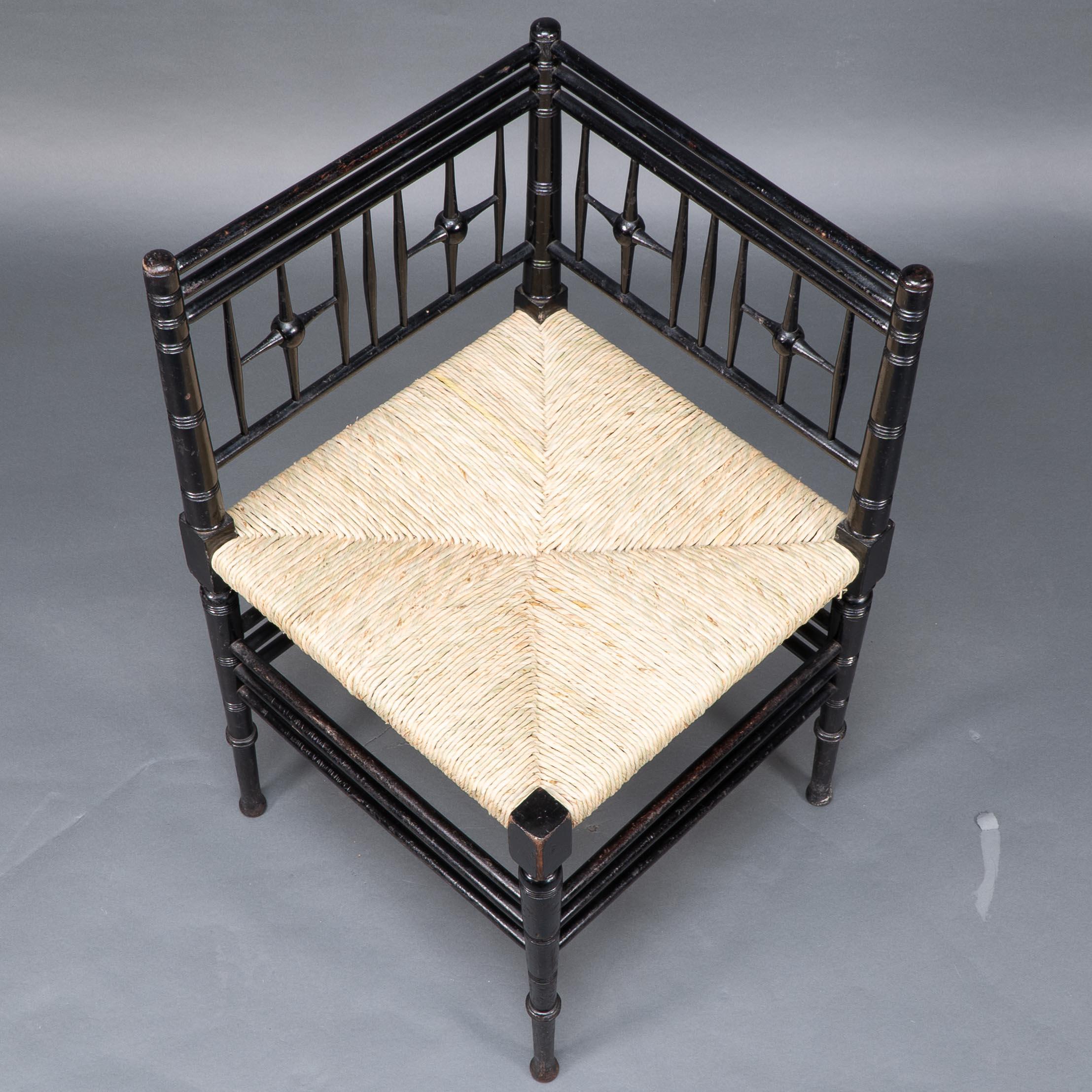 Liberty & Co. Aesthetic Movement ebonized corner armchair from the Argyll suite For Sale 3