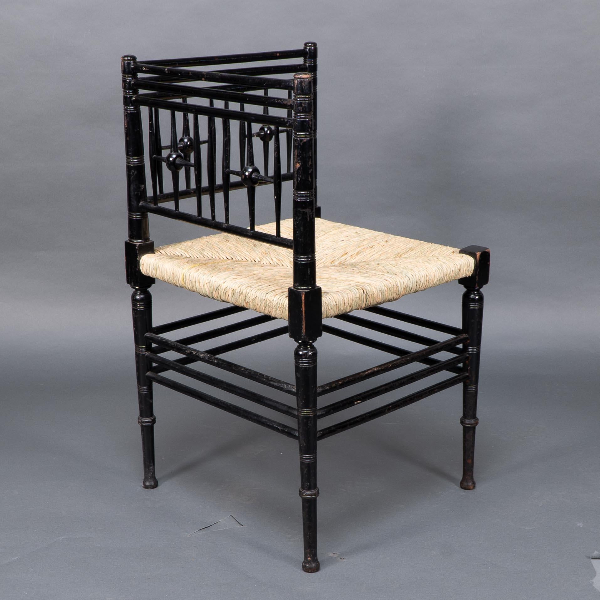 Liberty & Co. Aesthetic Movement ebonized corner armchair from the Argyll suite In Good Condition In London, GB