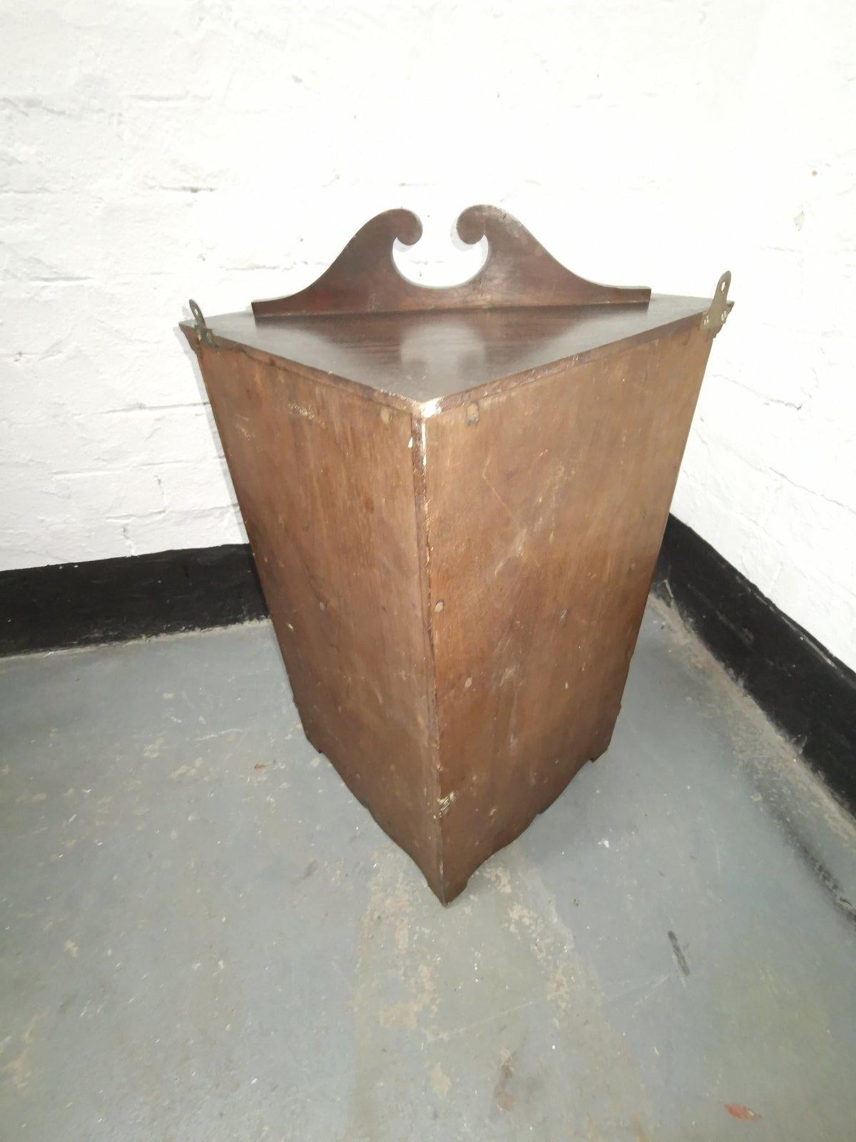 Liberty & Co Aesthetic Movement Walnut Corner Cupboard with Embossed Bird Panel In Good Condition For Sale In London, GB