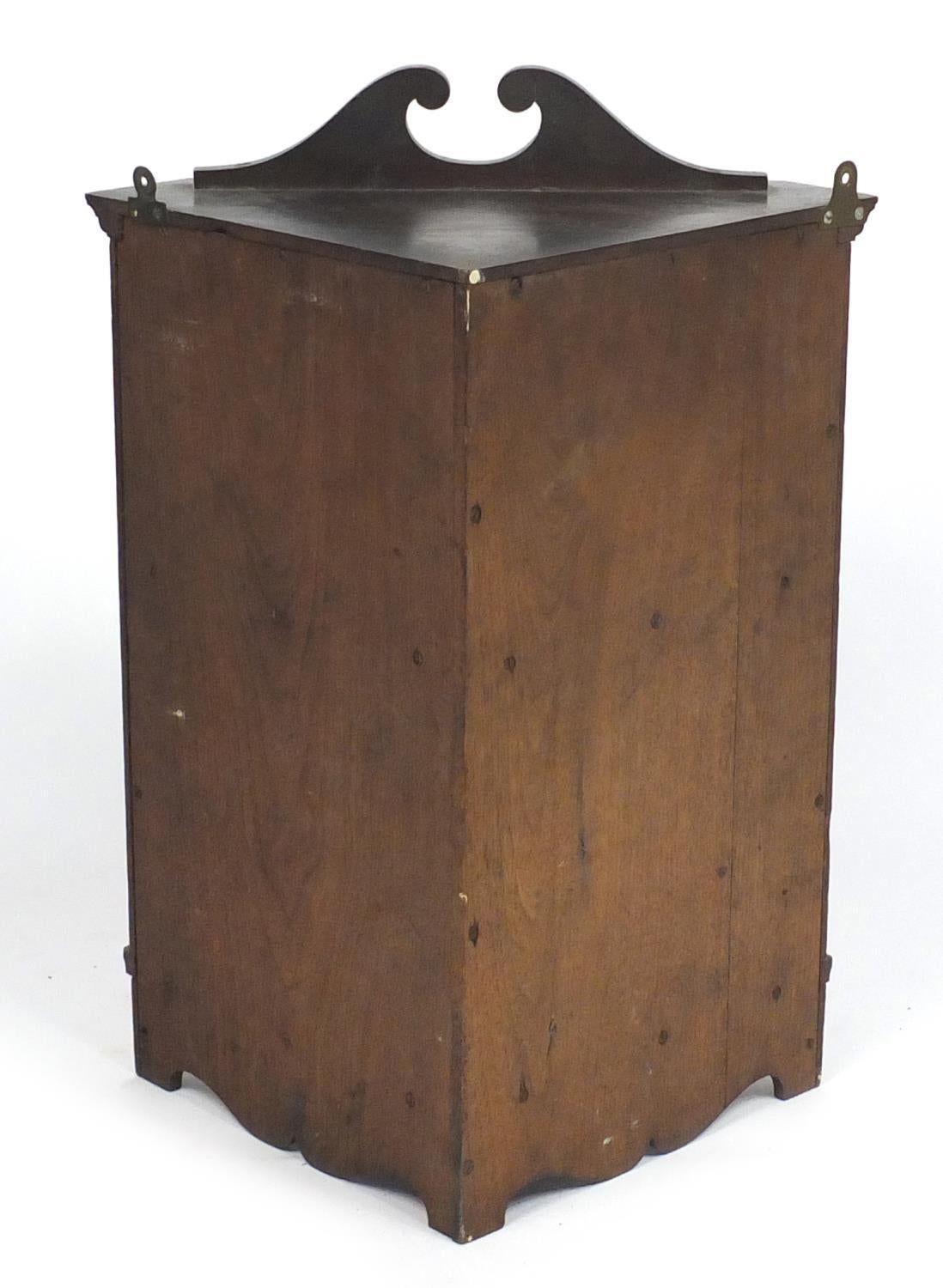 Late 19th Century Liberty & Co Aesthetic Movement Walnut Corner Cupboard with Embossed Bird Panel For Sale