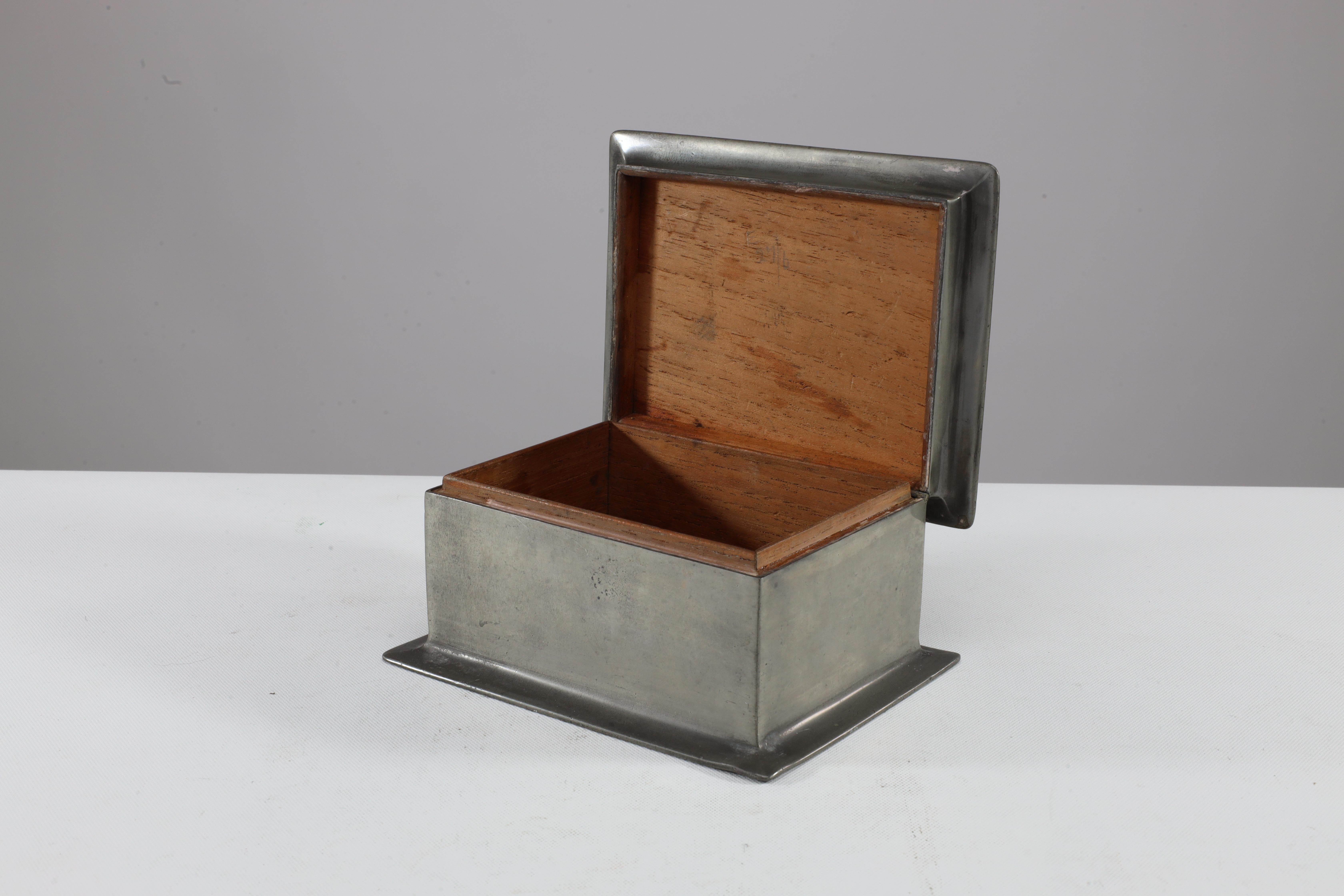 Pewter Liberty & Co. An Arts & Crafts ceder lined pewter jewelry box For Sale