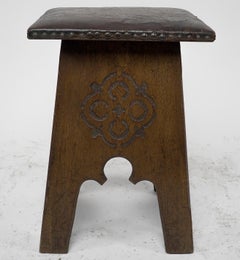 Liberty & Co, an Arts & Crafts Moorish Oak Stool with Embossed Leather Seat
