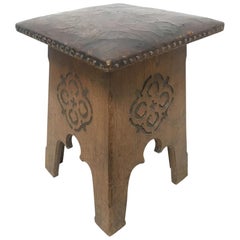 Liberty & Co, an Arts & Crafts Moorish Oak Stool with Embossed Leather Seat
