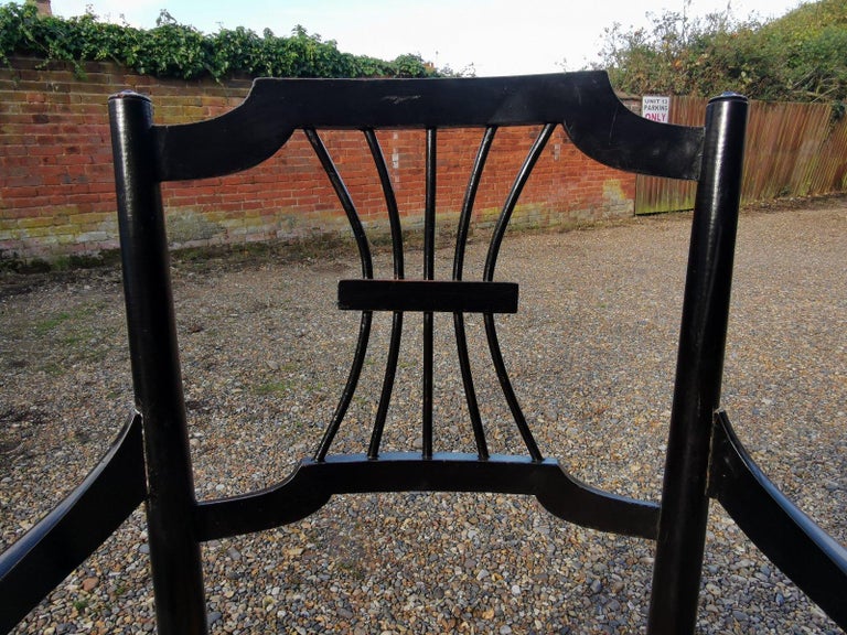 Liberty & Co. an English Aesthetic Movement Ebonised Armchair with Seagrass Seat For Sale 1