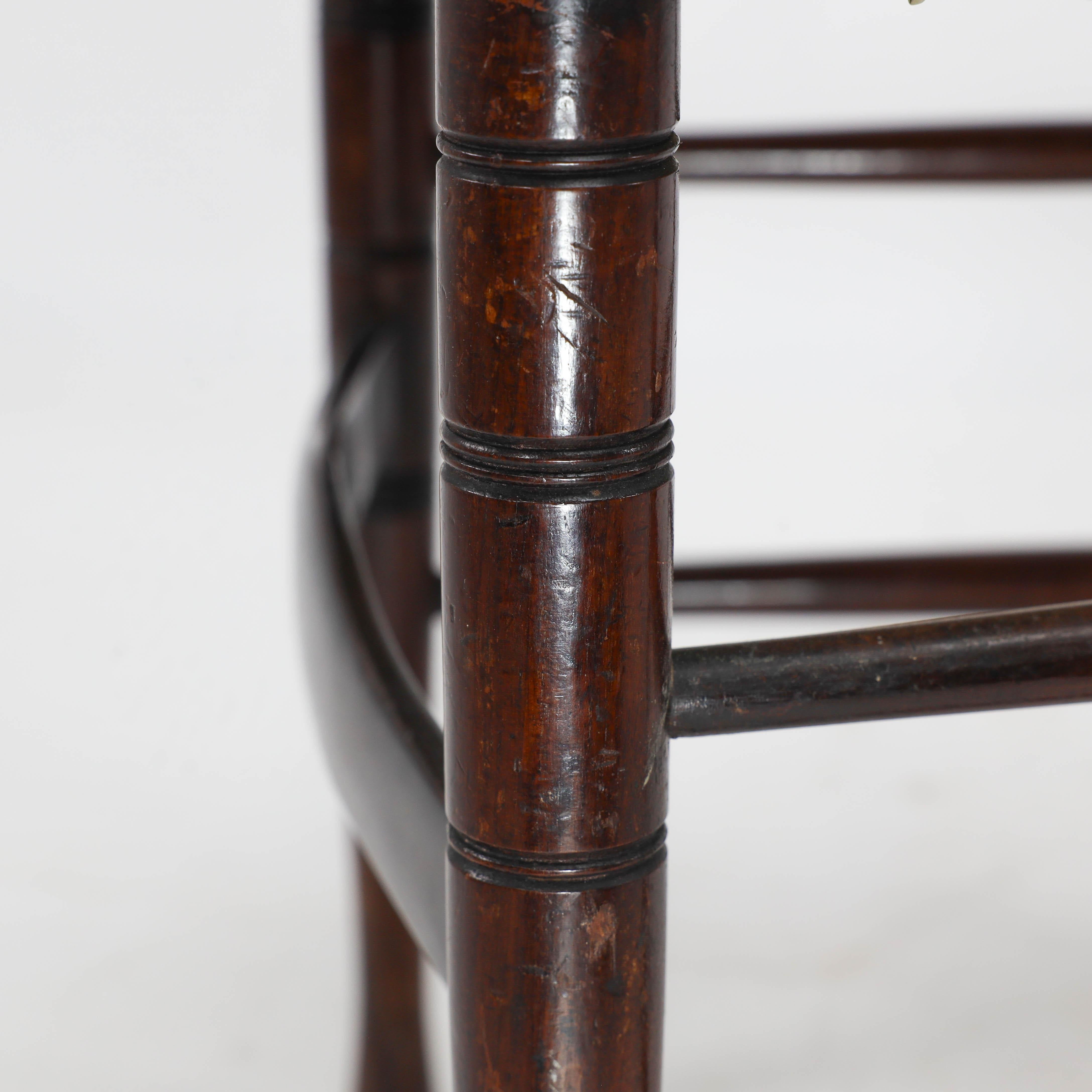 Liberty & Co. An English Aesthetic Movement walnut ladder back rush seat chair For Sale 1