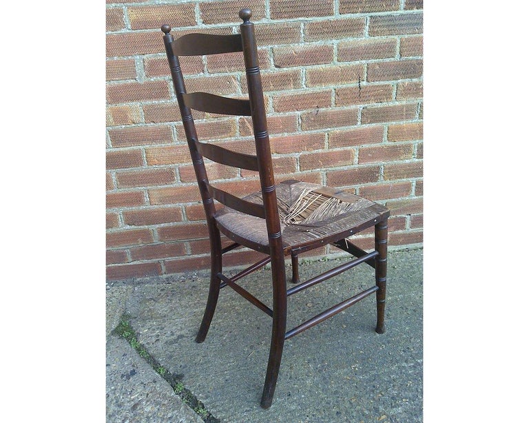 Hand-Crafted Liberty & Co. an English Aesthetic Movement Walnut Ladder Back Side Chair For Sale
