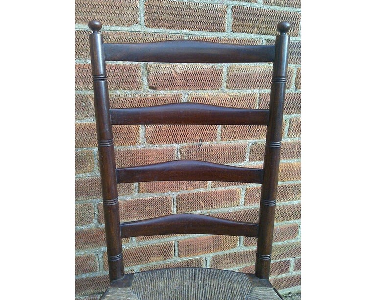 Liberty & Co. an English Aesthetic Movement Walnut Ladder Back Side Chair In Good Condition For Sale In London, GB
