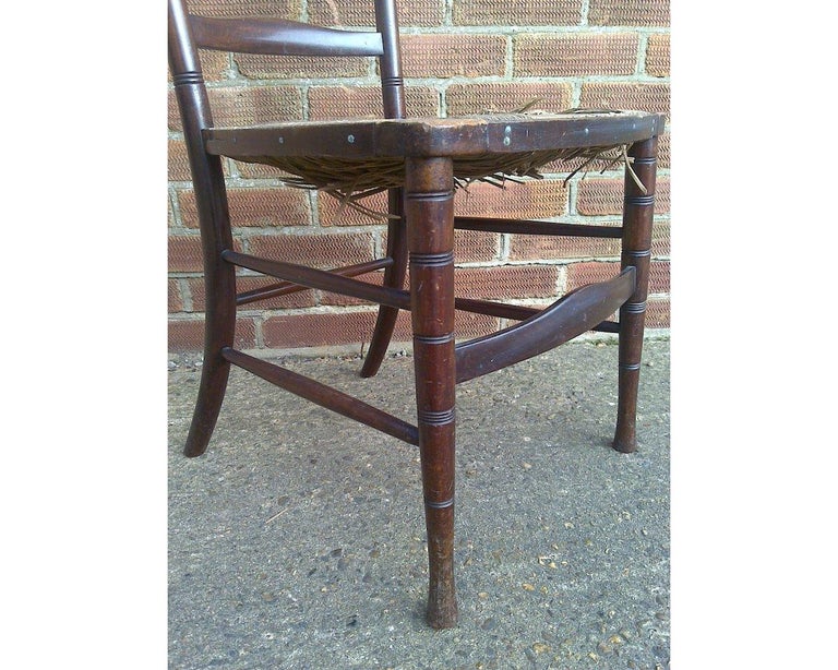 Late 19th Century Liberty & Co. an English Aesthetic Movement Walnut Ladder Back Side Chair For Sale