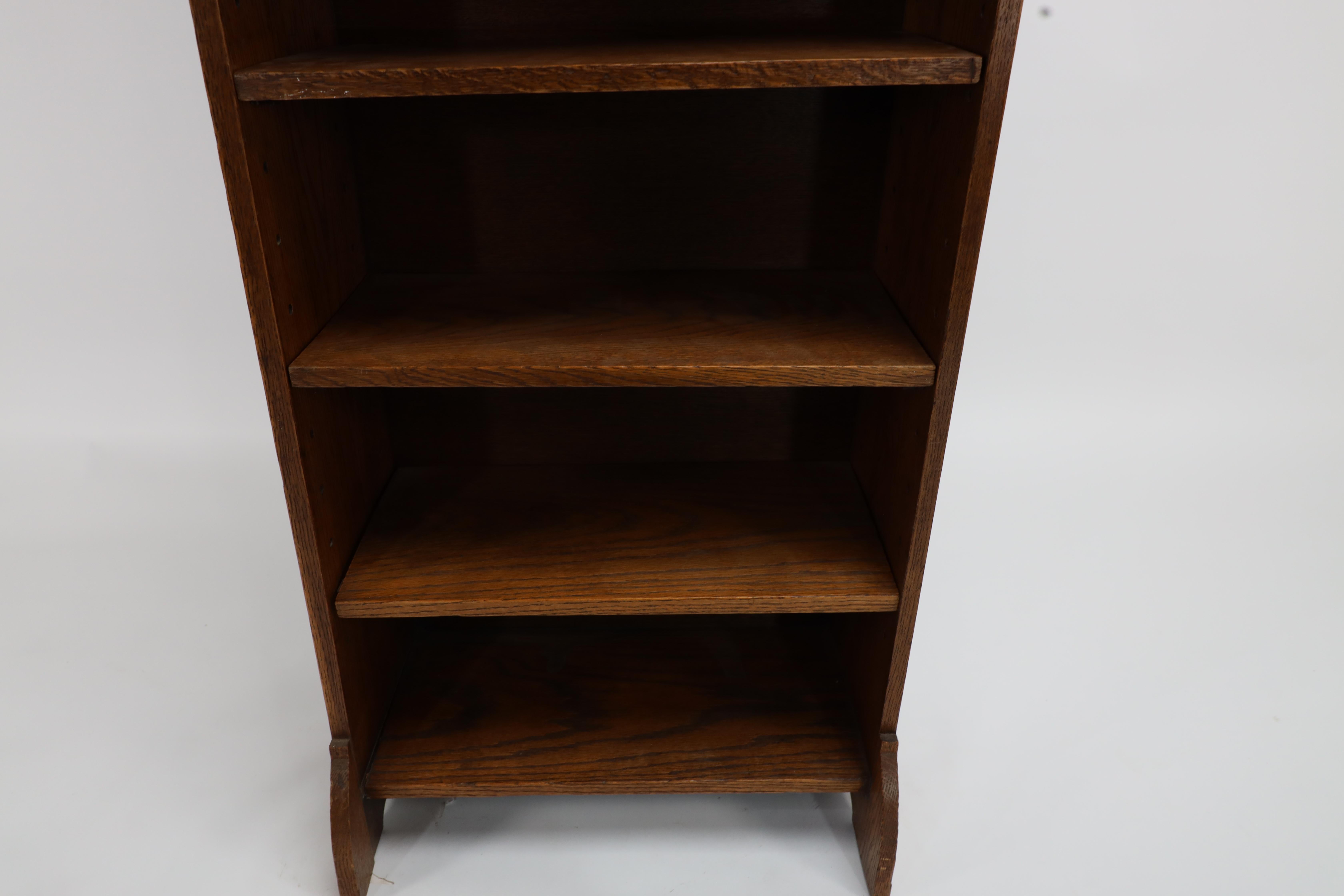 Liberty & Co. an English Arts & Crafts Oak Bookcase, with Shaped Upper Details For Sale 5