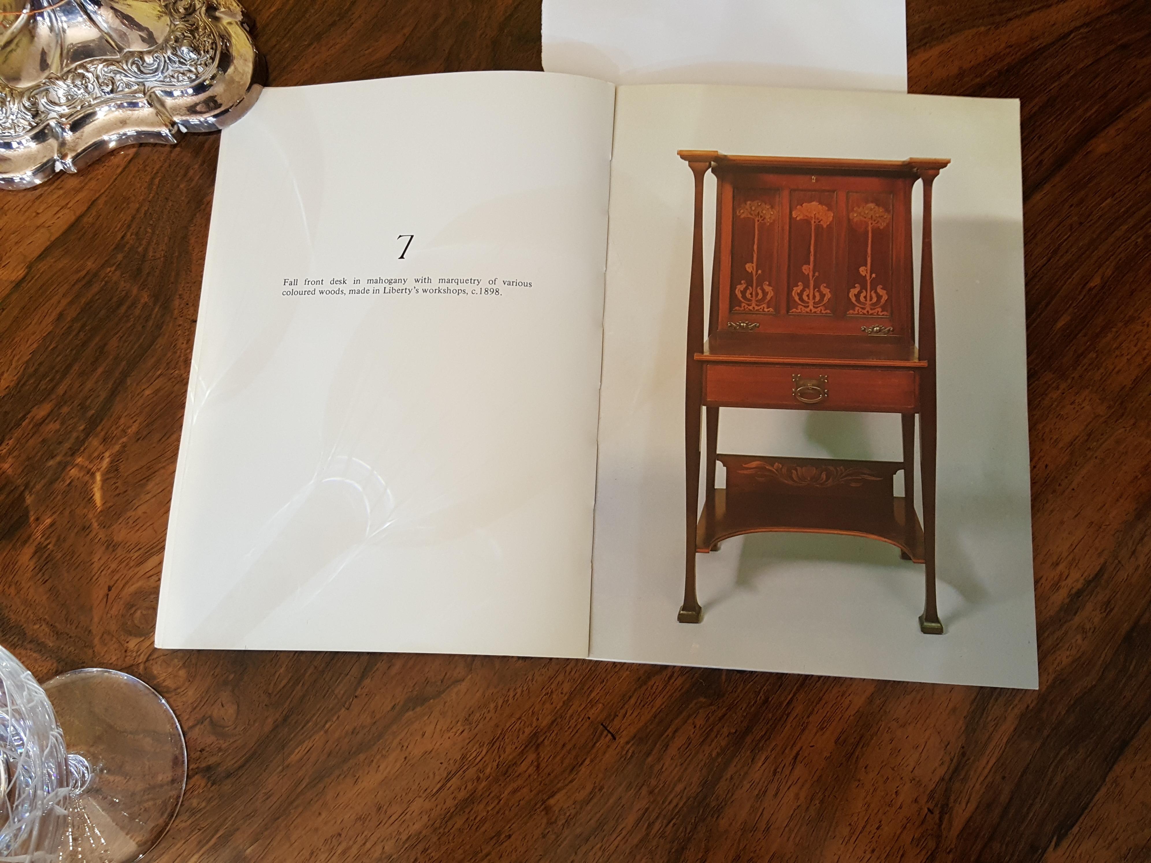 Liberty & Co. Art Nouveau mahogany fall front escritoire desk with Marquetry and pen work inlays and fitted interior, circa 1898
Measures: 28