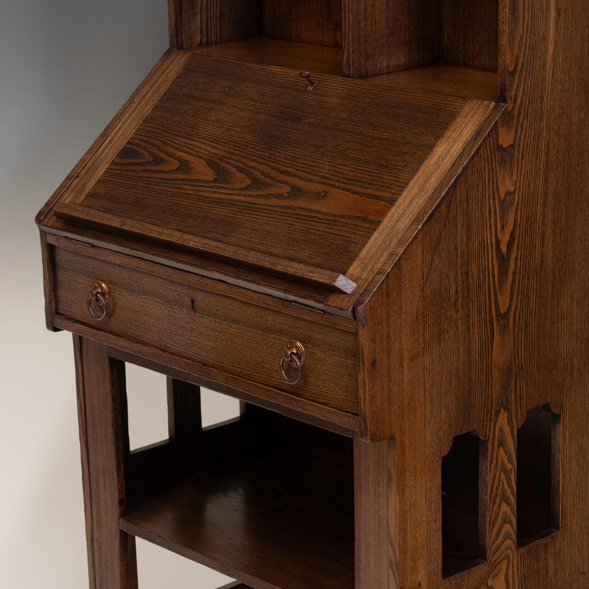 Liberty & Co Arts & Crafts ash bureau writing desk. Circa 1895. Labelled.

Retaining the red Liberty & Co paper label to the inside drawer. This design is also illustrated in Daryl Bennett's 'Liberty's Furniture' in figure 5.32 on page 173. Dated