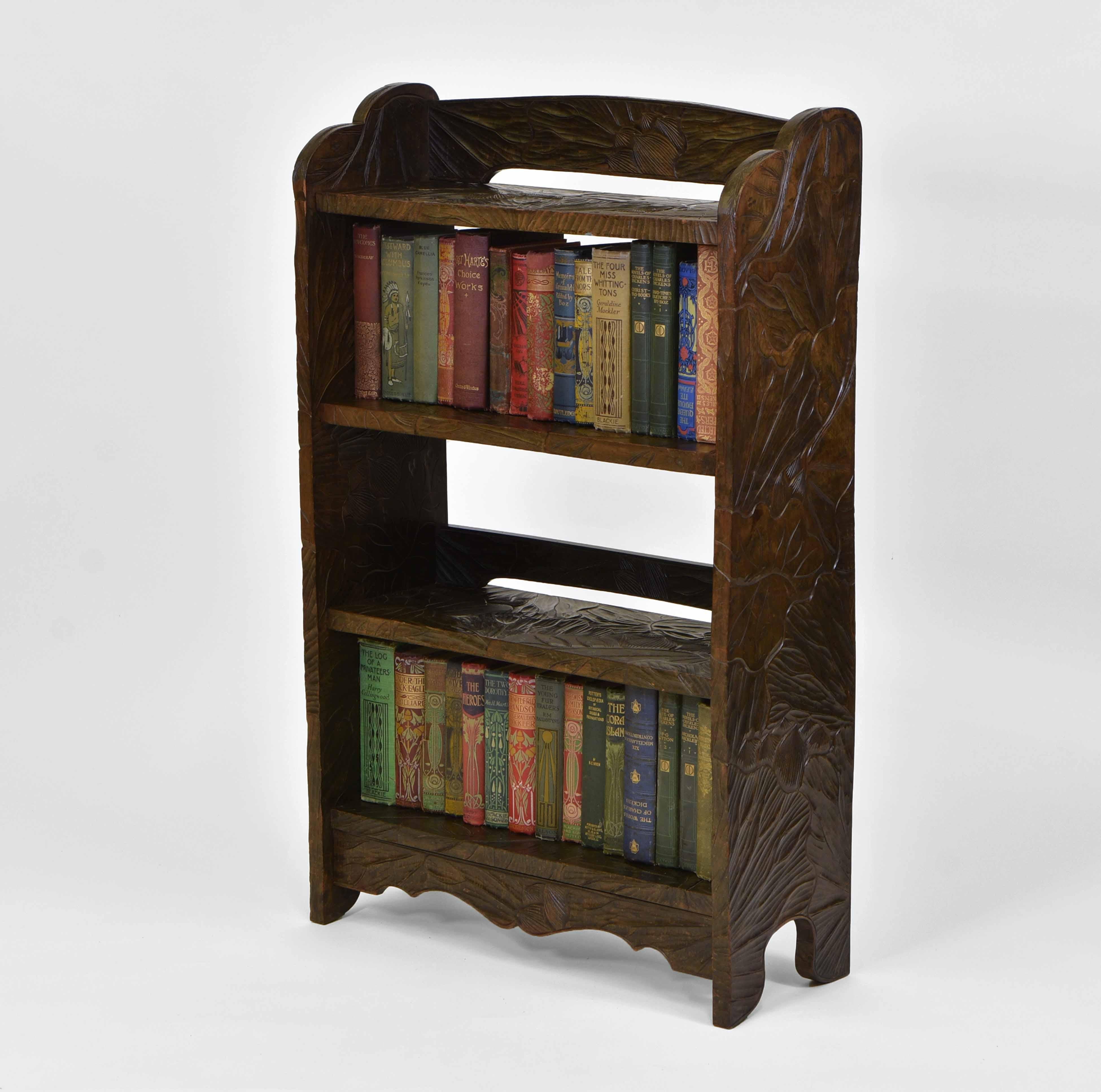 A Japanese fruitwood carved small open bookcase, retailed by Liberty & Co. Circa 1900.

These were commissioned by Liberty & Co, and hand-carved in Japan. The firm imported Middle Eastern and Asian goods sympathetic to the ideals of the Art