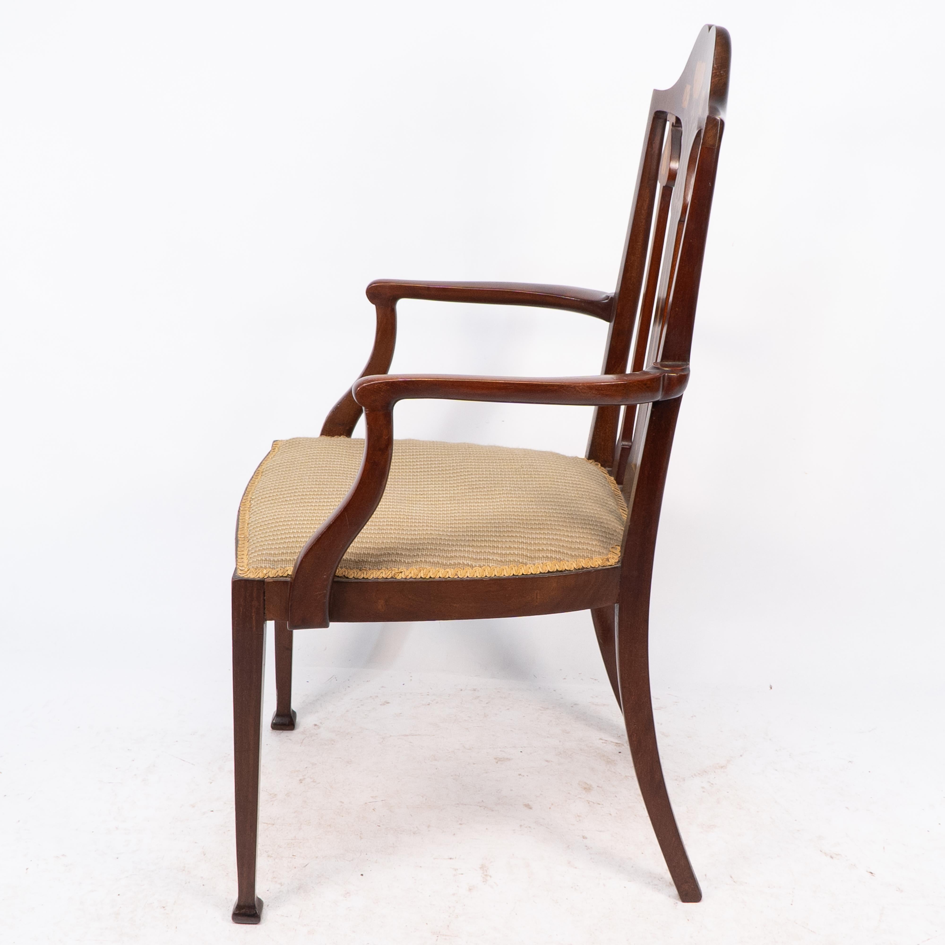 English Liberty & Co. Arts & Crafts mahogany armchair with fruitwood floral inlaid decor For Sale