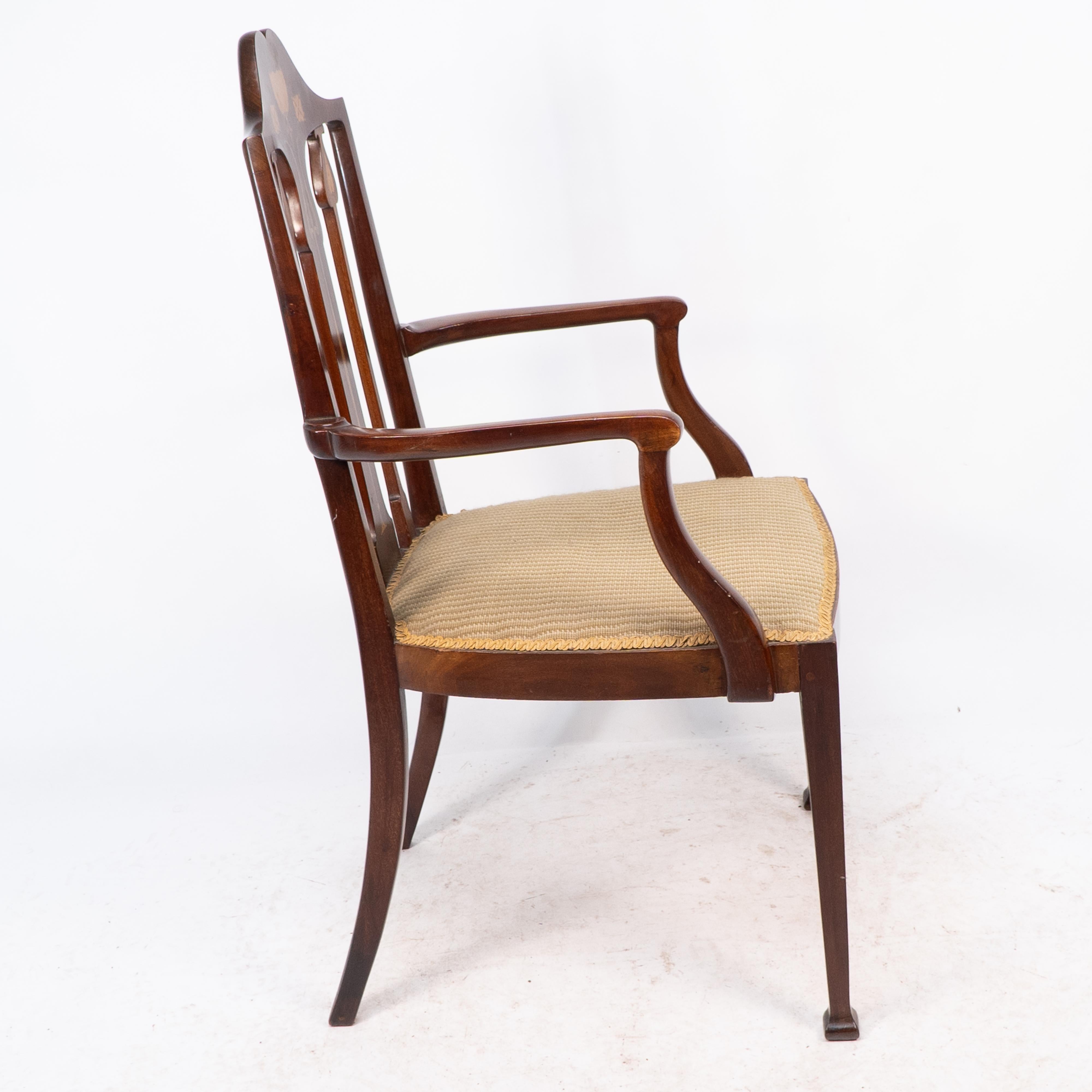 Liberty & Co. Arts & Crafts mahogany armchair with fruitwood floral inlaid decor In Good Condition For Sale In London, GB