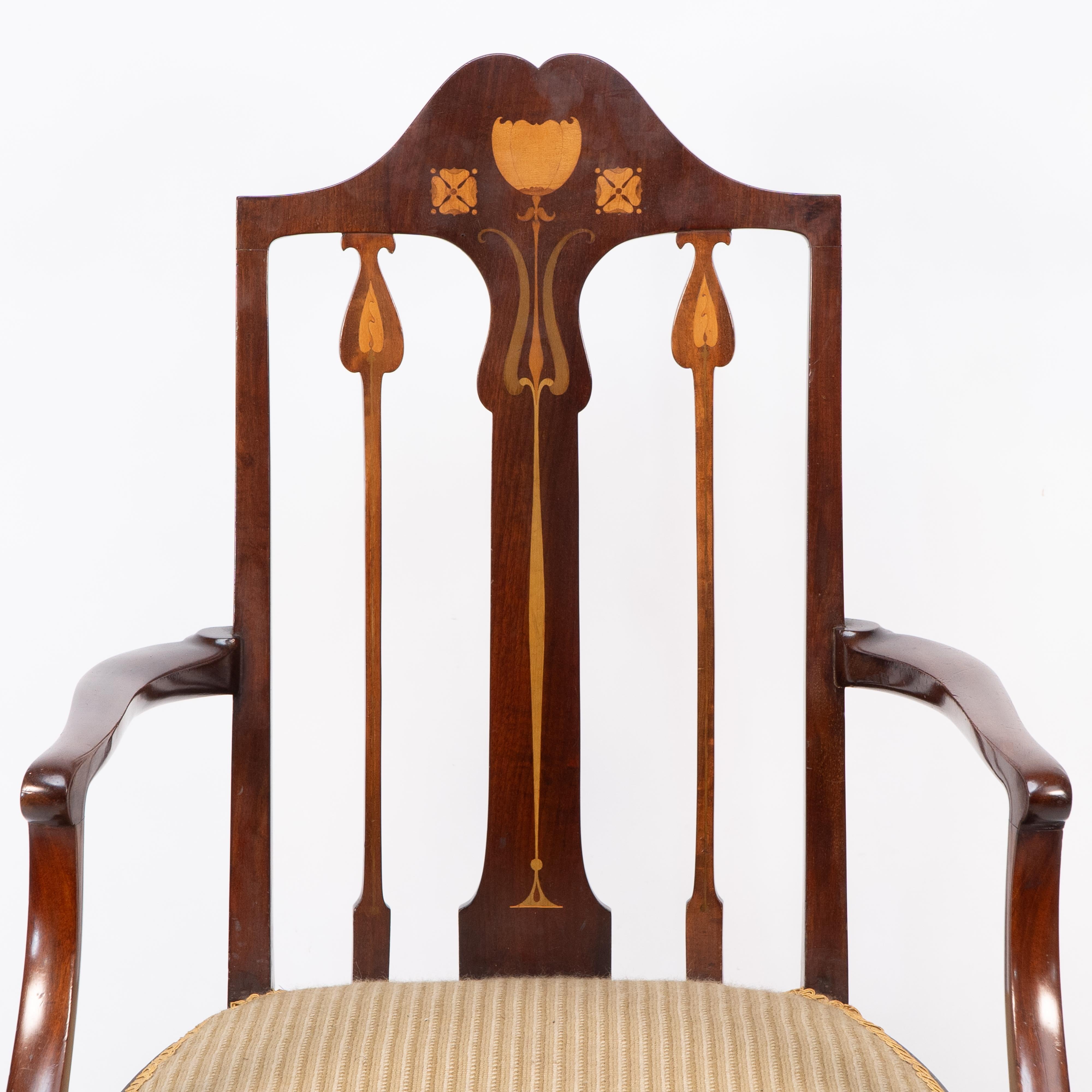 Early 20th Century Liberty & Co. Arts & Crafts mahogany armchair with fruitwood floral inlaid decor For Sale