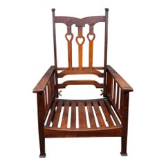 Liberty & Co. Arts & Crafts Reclining Armchair with Carved Floral Details