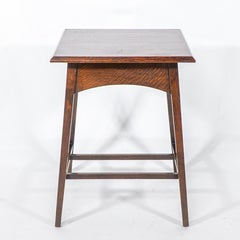 Liberty & Co attr. A good quality well designed Arts & Crafts oak side table
