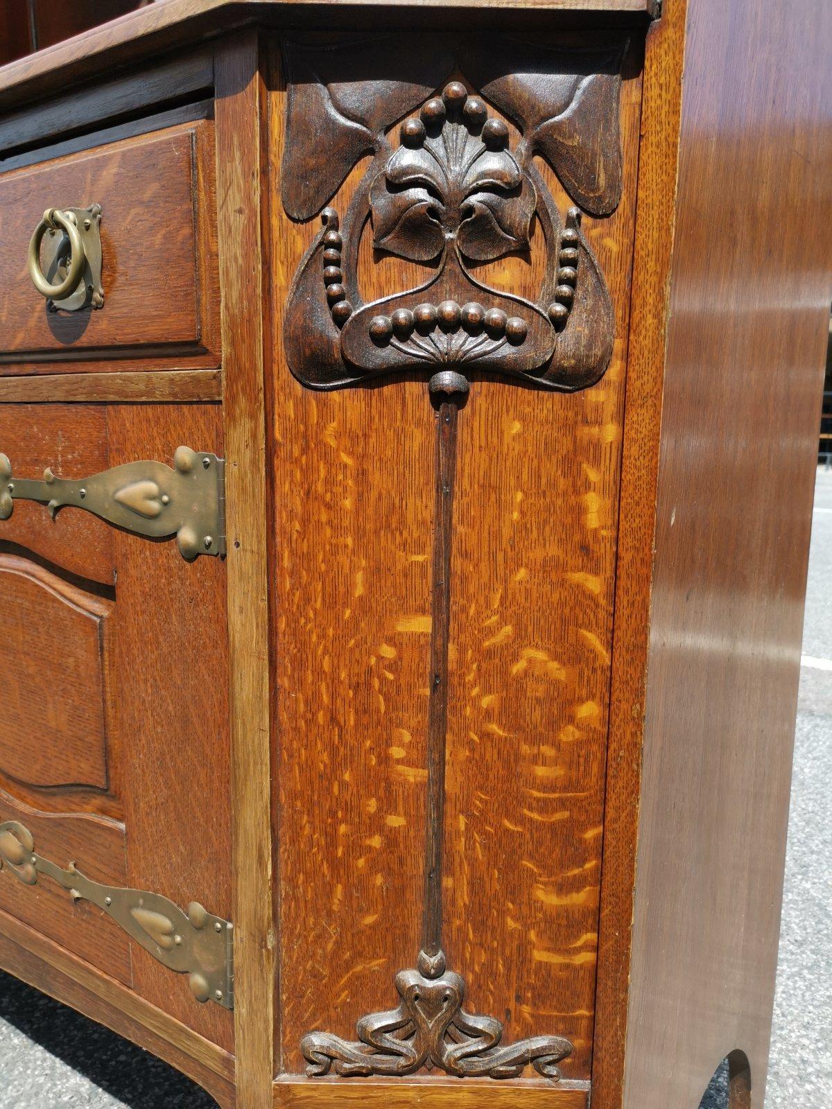 Liberty & Co Attr. An English Arts & Crafts Oak Sideboard with Carved Decoration For Sale 4