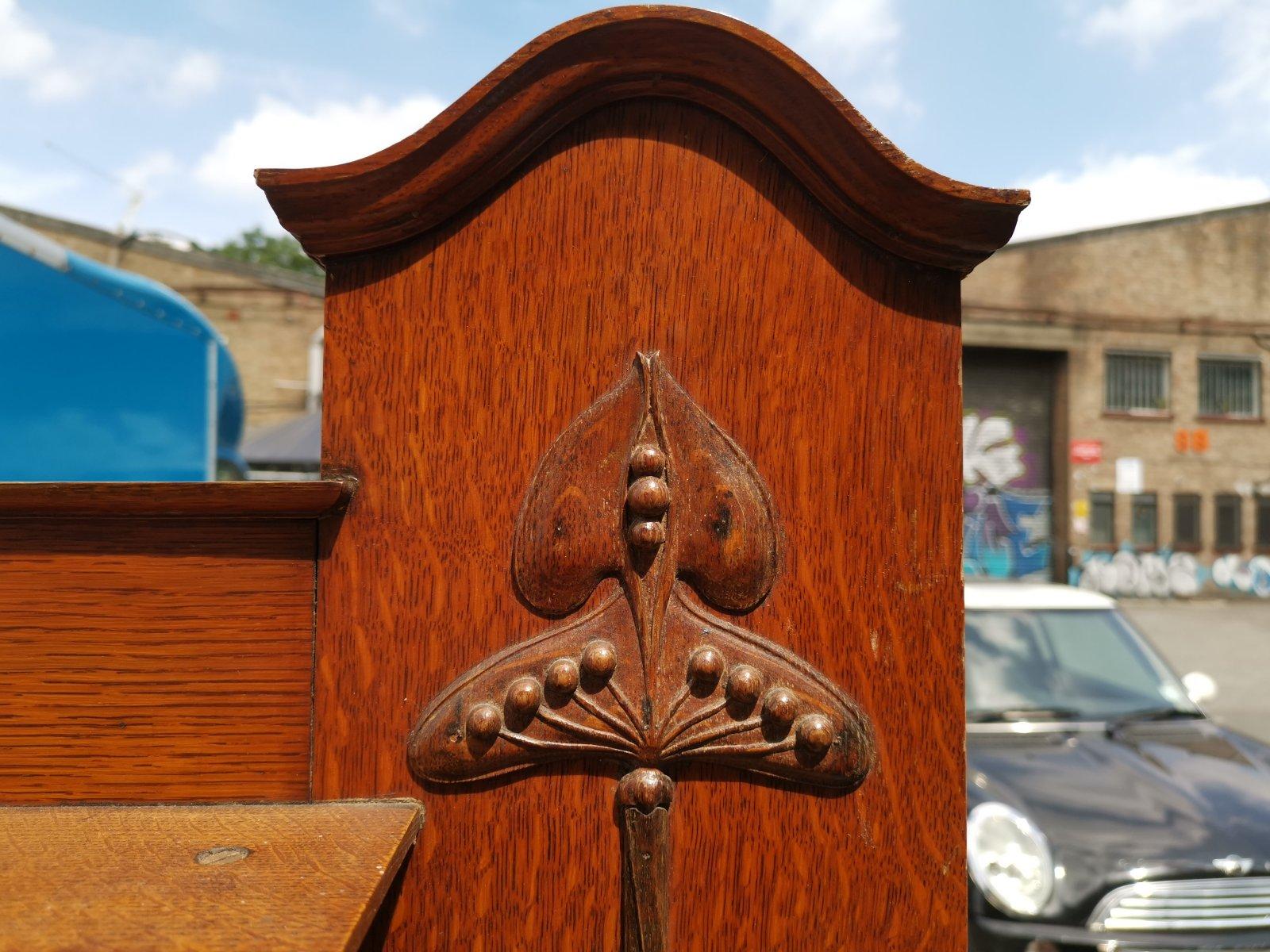 Liberty & Co Attr. An English Arts & Crafts Oak Sideboard with Carved Decoration For Sale 1