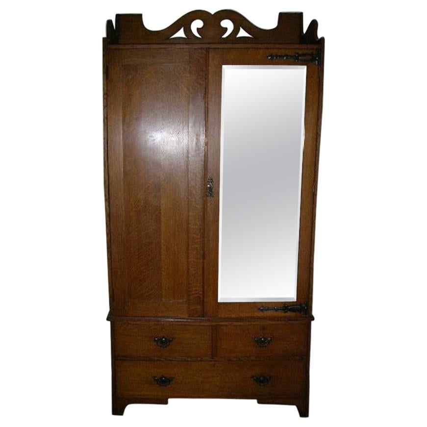Liberty & Co. Attr Arts & Crafts Oak Double Wardrobe with Stylized Cut-Outs