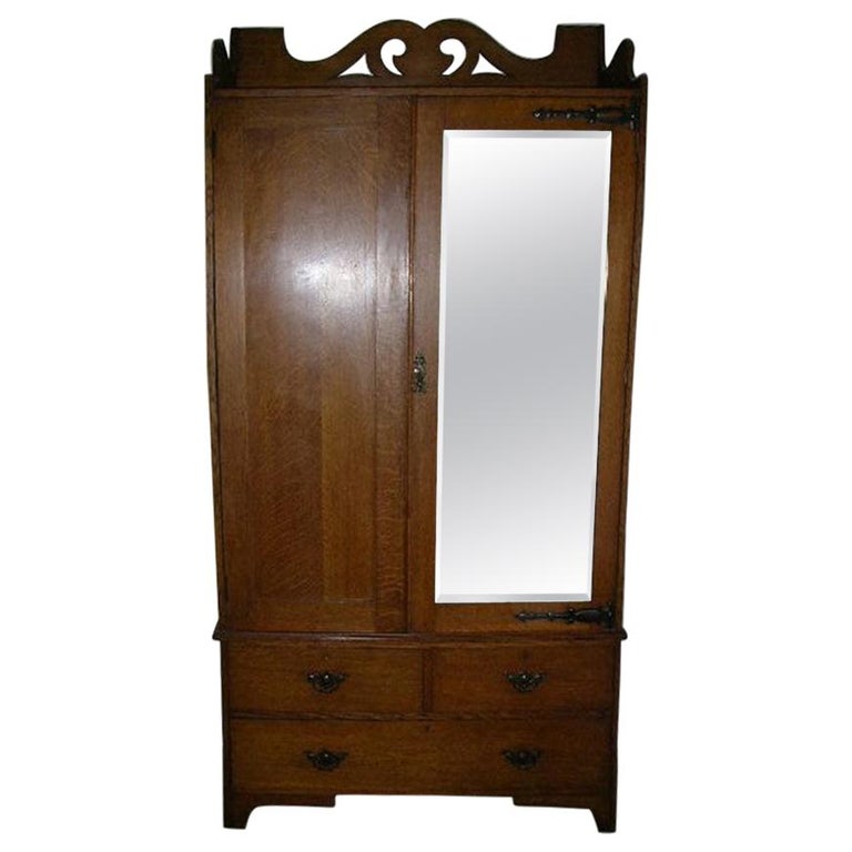 Liberty and Co. Attr Arts and Crafts Oak Double Wardrobe with Stylized  Cut-Outs For Sale at 1stDibs | liberty wardrobe