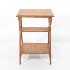 Liberty & Co attr. Arts & Crafts oak three tier side table with angle supports