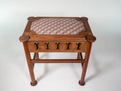 Liberty & Co attri. Glasgow School walnut piano stool w. storage under the seat