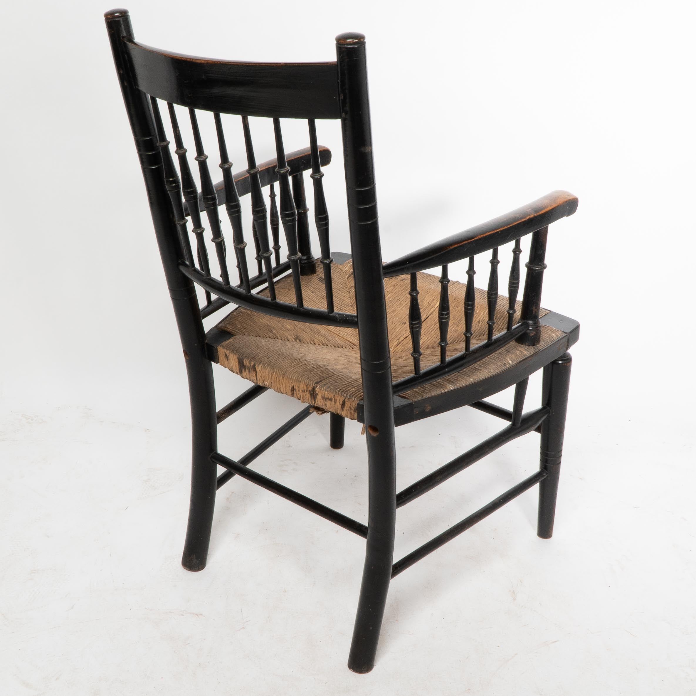 Liberty & Co, attribué. Fauteuil à assise en jonc Aesthetic Movement en vente 9