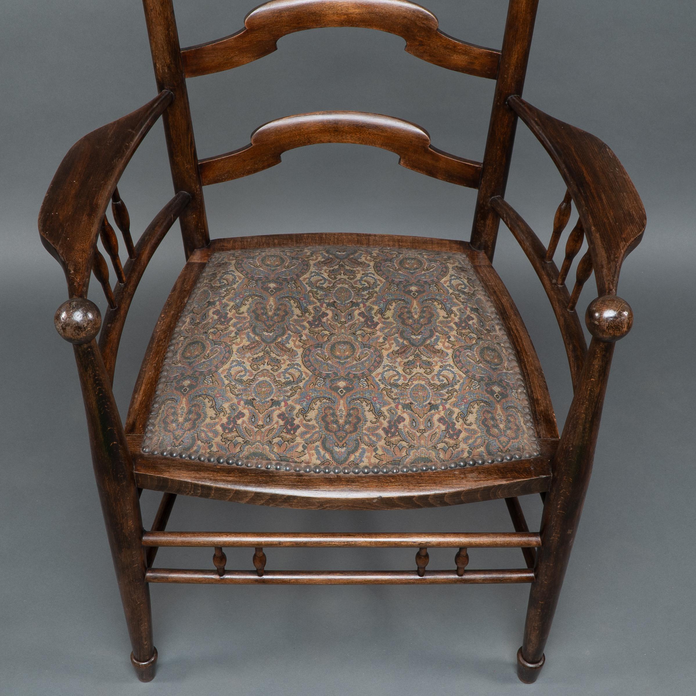 Liberty & Co Attributed, an English Walnut Arts & Crafts Ladder Back Armchair For Sale 3