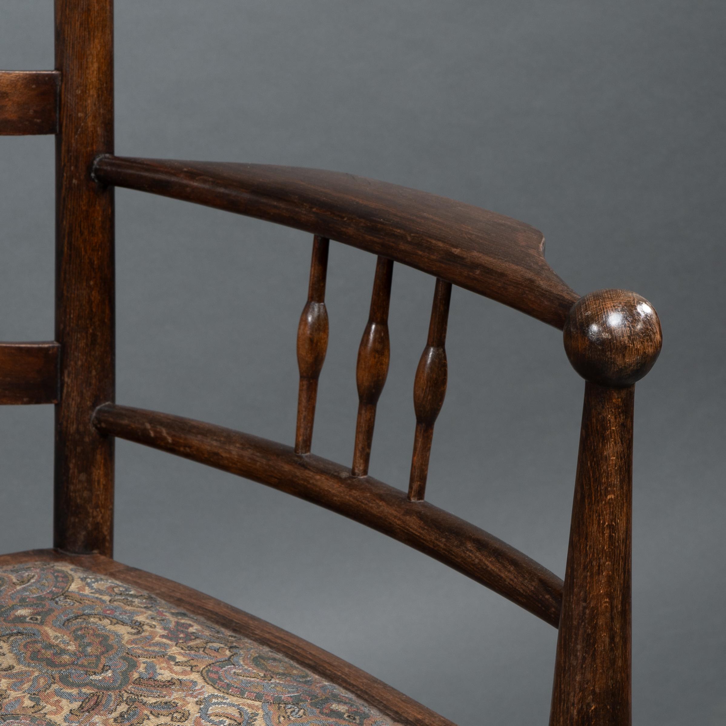 Liberty & Co Attributed, an English Walnut Arts & Crafts Ladder Back Armchair For Sale 4
