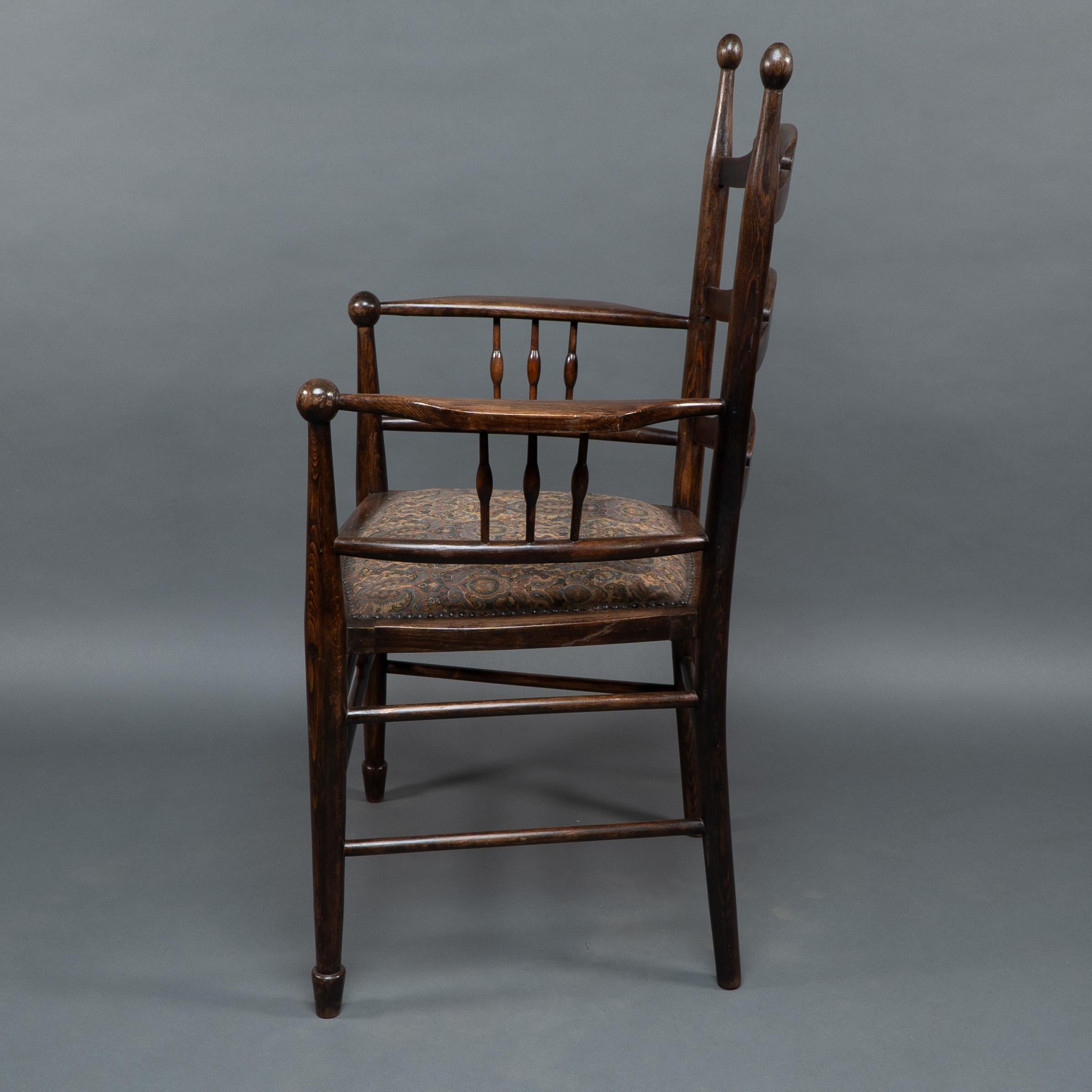 Hand-Crafted Liberty & Co Attributed, an English Walnut Arts & Crafts Ladder Back Armchair For Sale