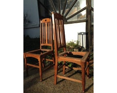 Liberty & Co Four English Arts & Crafts Oak Dining Chairs with Heart Cut-Outs