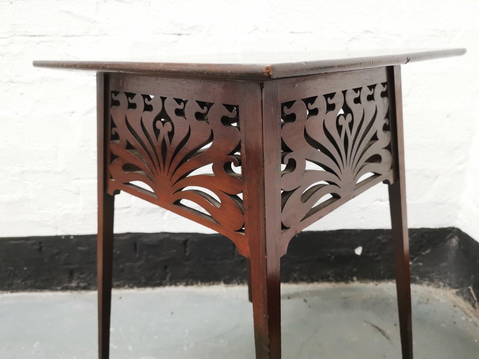 English Liberty & Co, in the Style of A H Mackmurdo, an Art Nouveau Mahogany Side Table